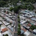 This aerial view shows the 10 de Octubre residential neighbourhood in San Marcos, El Salvador, on June 14, 2025. D
