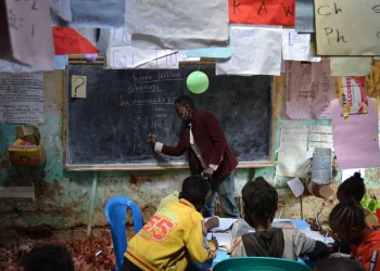 A facilitator teaches numbers to pupils in a second chance classroom in Sidama Region, Ethiopia. October 26, 2021.