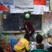 A facilitator teaches numbers to pupils in a second chance classroom in Sidama Region, Ethiopia. October 26, 2021.