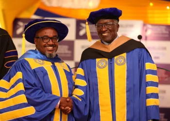 Ambassador Dennis Awori alongside Prof. Mwenda Ntarangwi