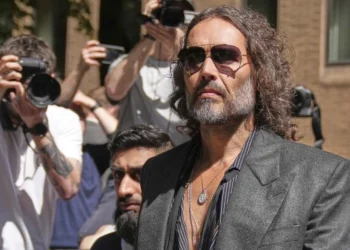 English comedian and actor Russell Brand leaves Southwark Crown Court where he is charged with rape and sexual assault in London, Friday, May 30, 2025.