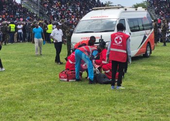 A mourner injured in a stampede at Mamboleo Stadium in Kisumu, where the viewing of Raila Odinga's body is underway.