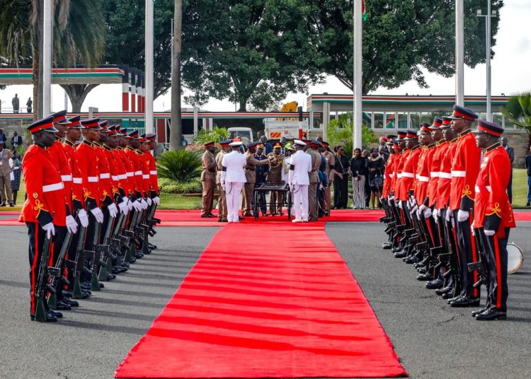 Military officers manning the gun carriage as the body of former Prime Minister Raila Odinga arrives at JKIA
