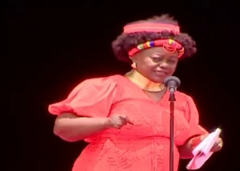 Suba North MP Millie Odhiambo speaking during former Prime Minister Raila Odinga's funeral on October 19, 2025