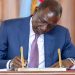 President William Ruto signs a bill at State House.