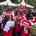 File image of Arsenal fans at Raila Odinga's gravesite in Bondo