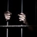 A person in a prison cell.