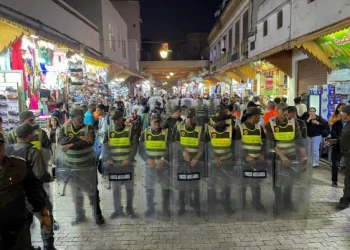 Members of the security forces stand guard as they prevent a protest demanding reforms in education and health from taking place, in Rabat, Morocco, September 29, 2025.