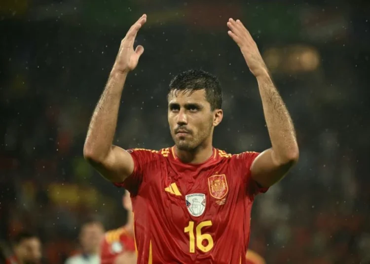 Spain players including Spain's midfielder Rodri celebrate after the UEFA Euro 2024 round of 16 football match between Spain and Georgia at the Cologne Stadium in Cologne on June 30, 2024