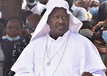 The late Raila Odinga clad in religious outfit.
