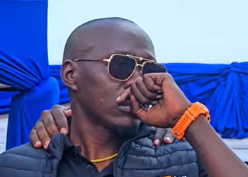 Oga Obinna weeping during Kimani Mbugua’s burial on Tuesday, October 28, 2025.