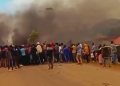 Tanzanian protesters in Sirari, near the Kenya-Tanzania border, lit a bonfire in protest of the ongoing General Elections.