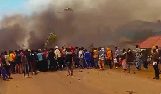 Tanzanian protesters in Sirari, near the Kenya-Tanzania border, lit a bonfire in protest of the ongoing General Elections.