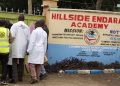Directorate of Criminal Investigation officers enter the Hillside Endarasha Academy compound in Nyeri on September 5, 2025