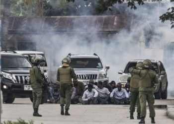 Tear gas fills the air as police confront protesters in Tanzania, October 29, 2025.