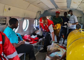 File image of medical personnel attending to the landslide victims