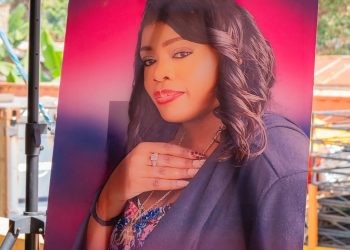 Betty-Bayos-portrait-during-her-burial-service