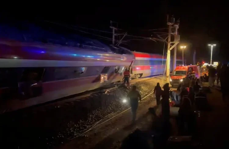 Emergency responders work at the site after a high-speed train derailed and smashed into another oncoming train, near Adamuz, in Cordoba, Spain, on January 18, 2026