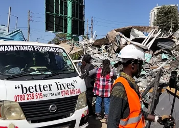A car owned by the Wamatangi Foundation parked near the wreckage after the demolitions on January 14, 2026.