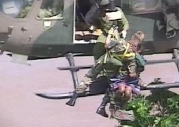 A file photo of when newborn Rosita and her mother were being winched to safety by helicopter