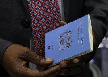 Deputy President Kithure Kindiki holding a passport on May 13, 2024