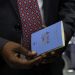 Deputy President Kithure Kindiki holding a passport on May 13, 2024