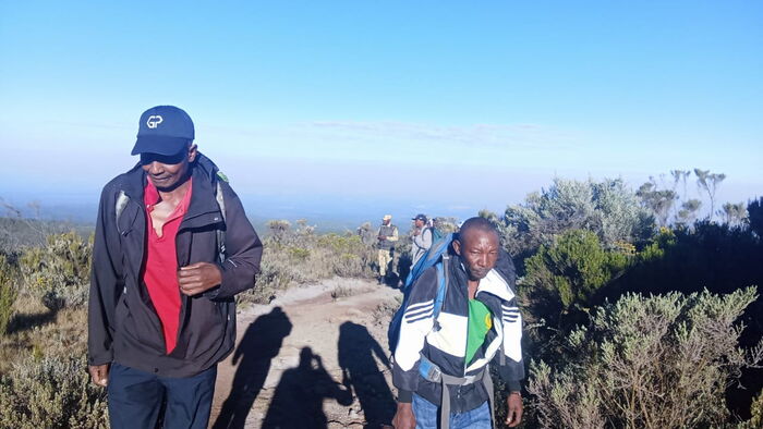 Porters assisting KWS officers in the search operation on January 9, 2025